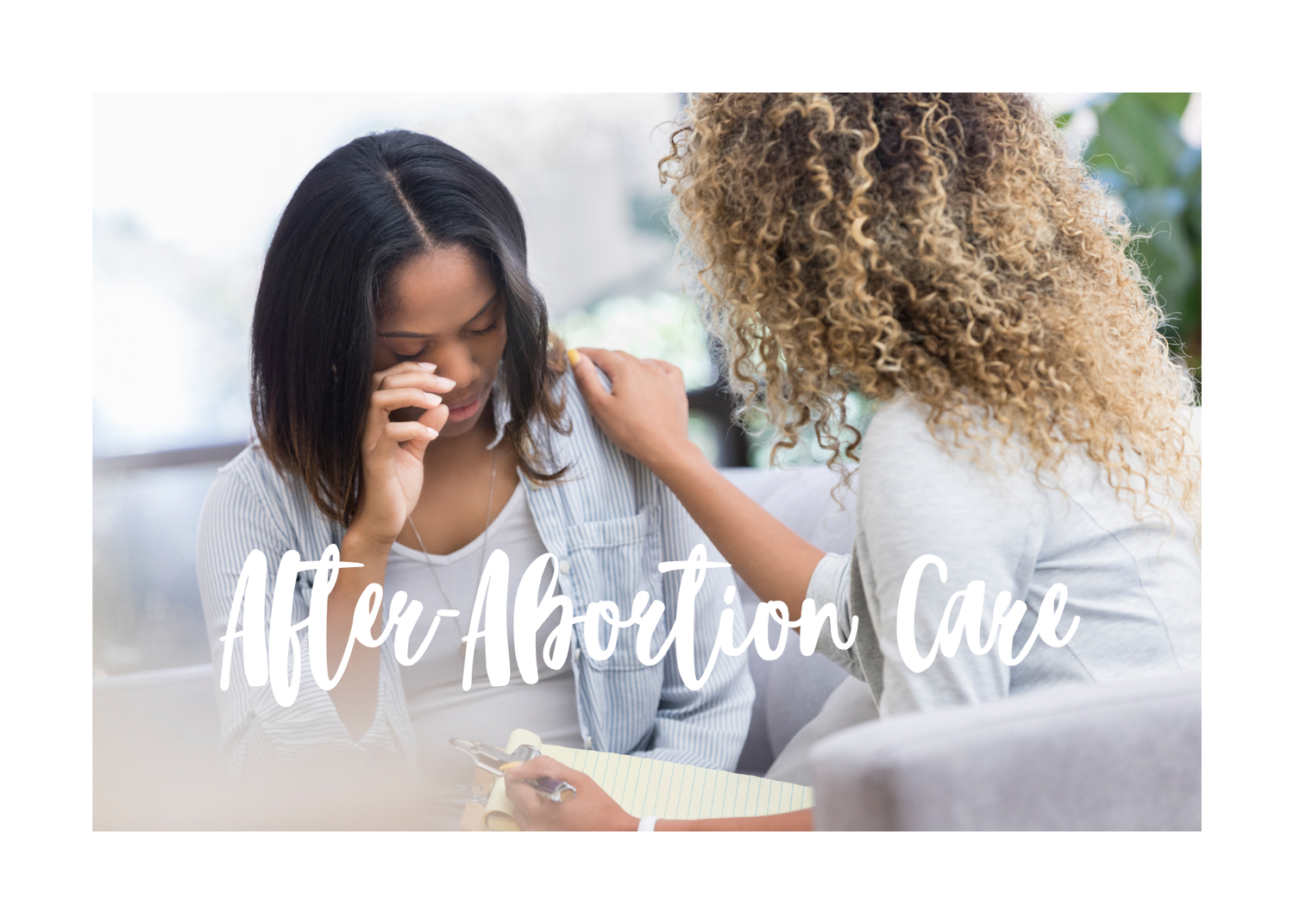 Counsellor comforting a woman during post abortion care support